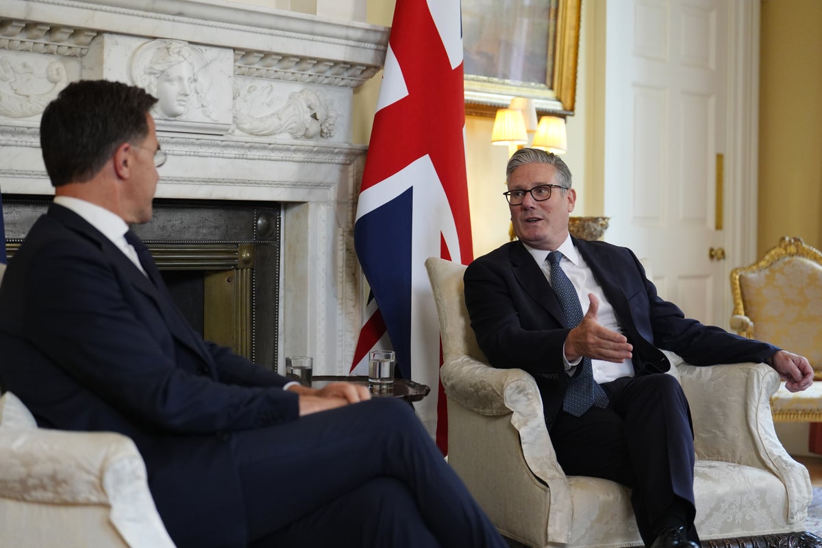 Nato boss says increase defence spending or start learning Russian