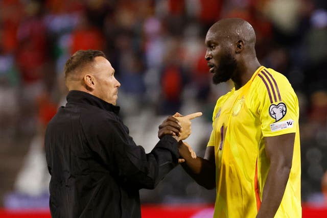 Wales boss Craig Bellamy speaks to Belgium striker Romelu Lukaku after his side’s 4-3 World Cup qualifying defeat in Brussels (Geert Vanden Wijngaert/AP)