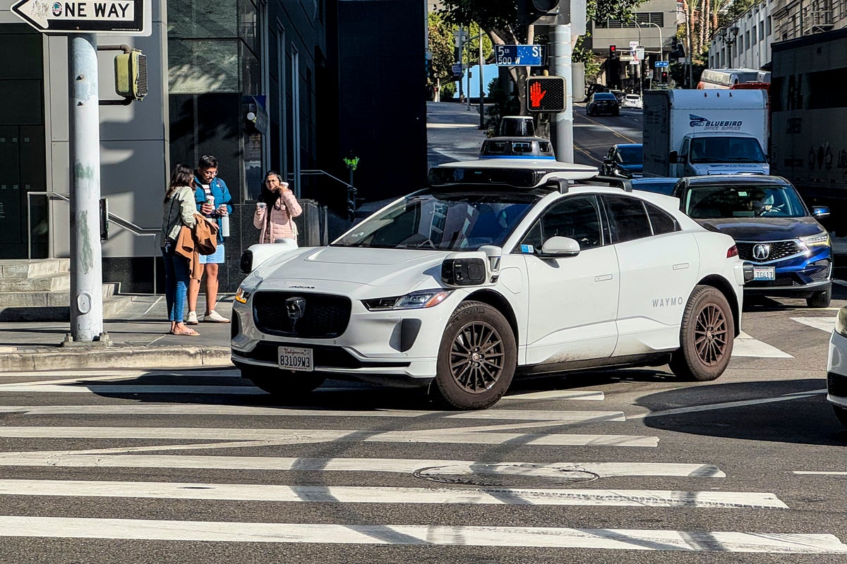 Self-driving taxis to be allowed on UK roads next year