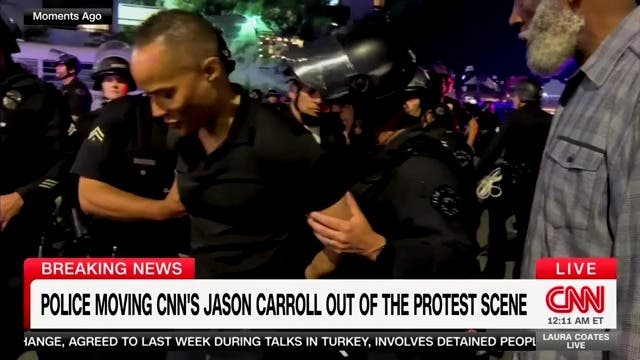 <p>CNN correspondent Jason Carroll was briefly detained by Los Angeles Police Department officers while reporting at a protest in the city. </p>