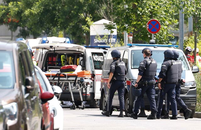 <p>Police and medical personnel outside the Dreiersch high school  following a shooting in Graz, Austria</p>