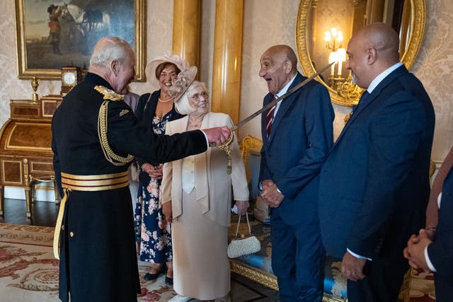 Rugby league star Billy Boston was knighted by the King at Buckingham Palace (Aaron Chown/PA)