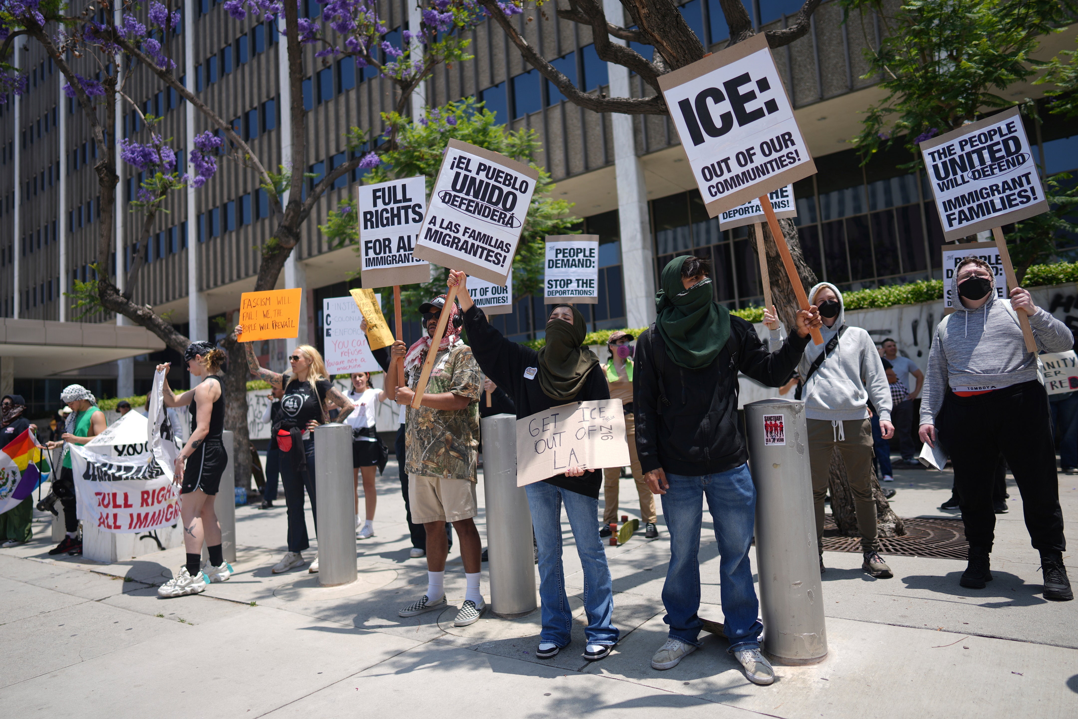 Protesters gather near the metropolitan detention center Monday, June 9, 2025, in downtown Los Angeles