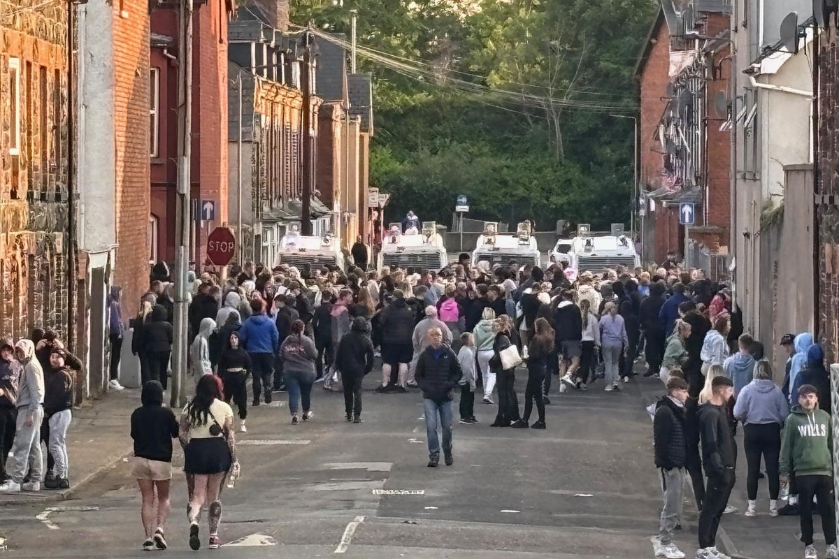 Riot police use water cannon after missiles thrown at officers during second night of unrest in Northern Ireland