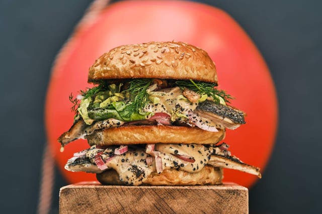 <p>A festival-born mash-up: this Big Mack(erel) swaps beef for mackerel, caviar sauce and a shower of pork scratchings</p>