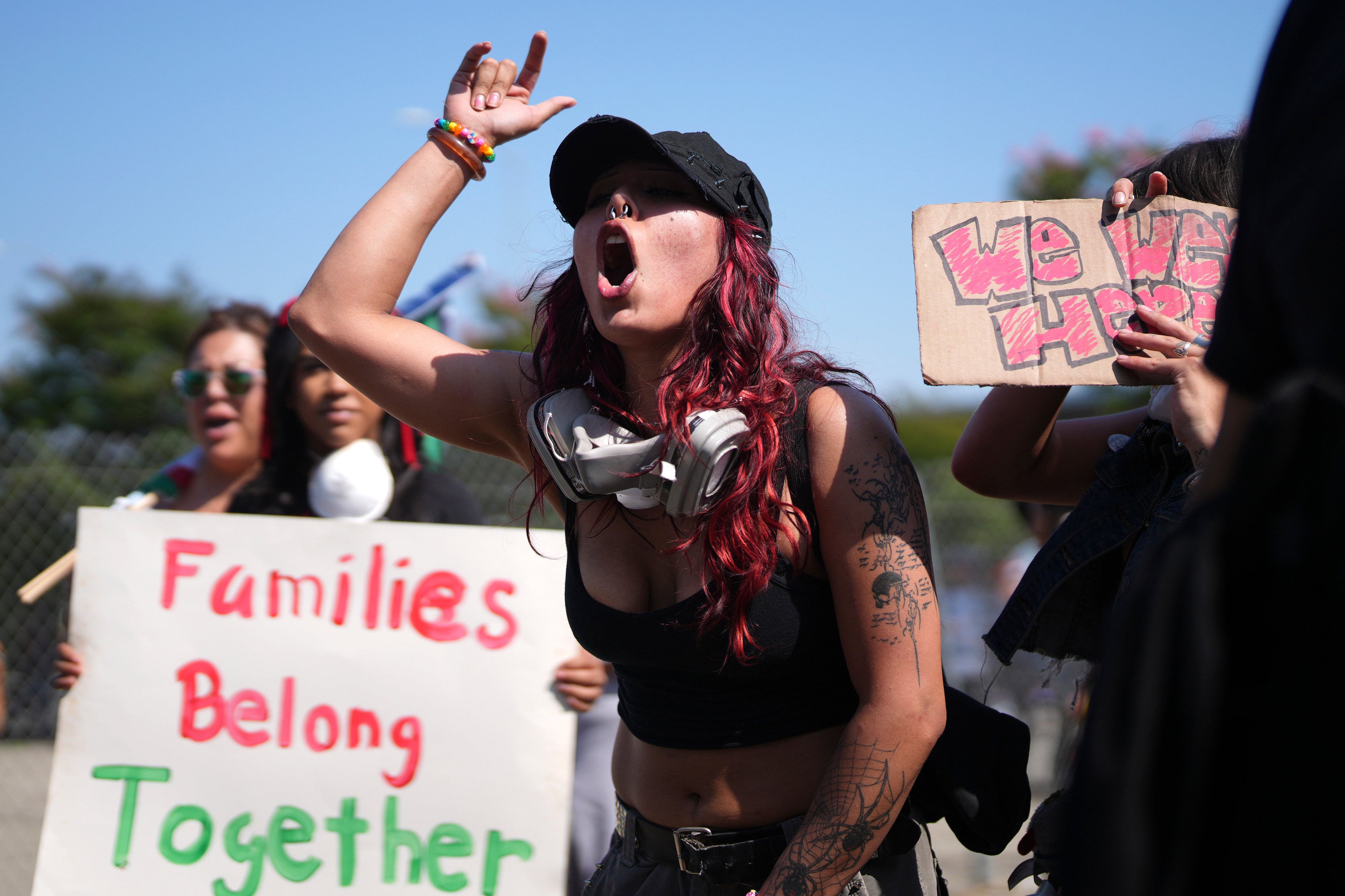 A protester denounces ICE operations in downtown Los Angeles, California, on Tuesday