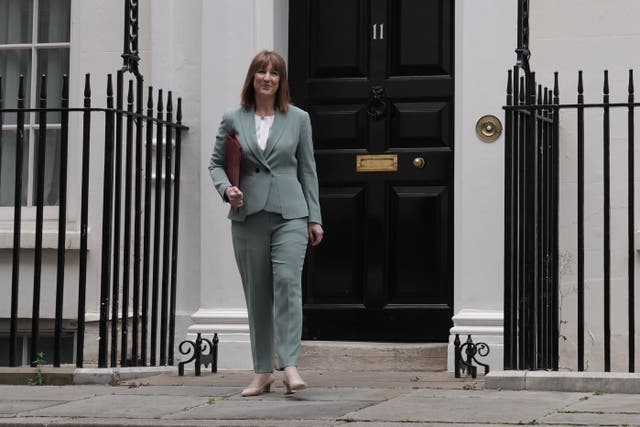 Rachel Reeves leaving 11 Downing Street before delivering her spending review in the House of Commons (Stefan Rousseau/PA)