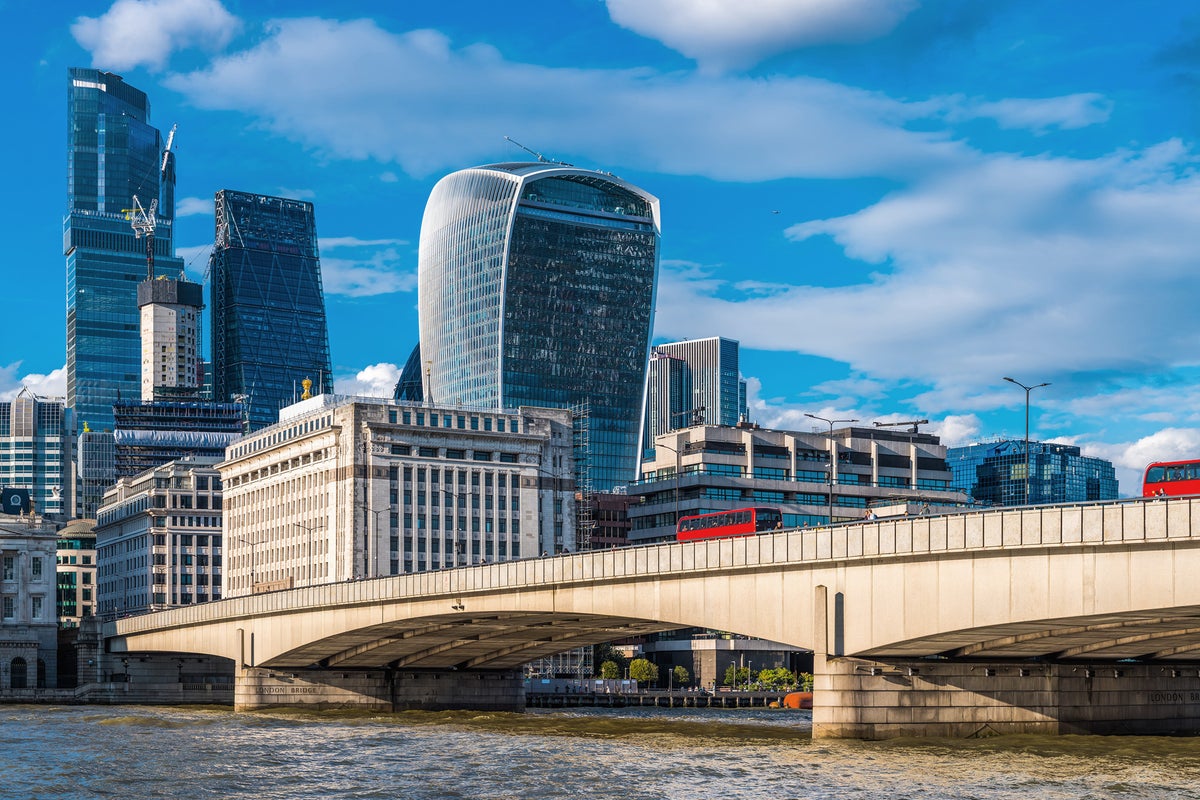 Woman rushed to hospital after crash between bus and bike on London Bridge