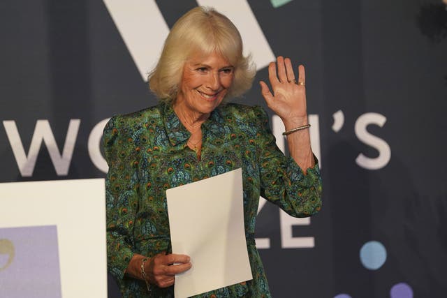 Camilla waves to the audience after delivering a speech at the Women’s Prize for Fiction and Non-Fiction event in London (PA)