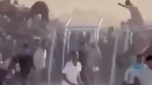 ‘Apocalyptic’ video shows hundreds of Palestinians rushing to aid site