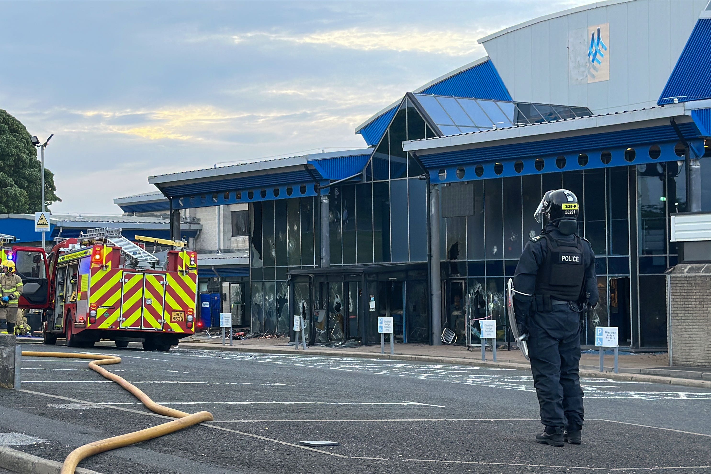 Emergency services at the scene where a fire has broken out at Larne Leisure Centre (Liam McBurney/PA)