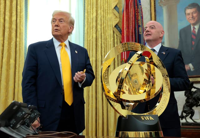 <p>US president Donald Trump speaks alongside Fifa president Gianni Infantino</p>