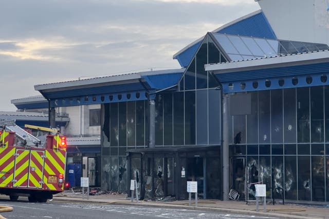 Firefighters at the scene where a fire has broken out at Larne Leisure Centre following vandalism at the facility (Liam McBurney/PA)