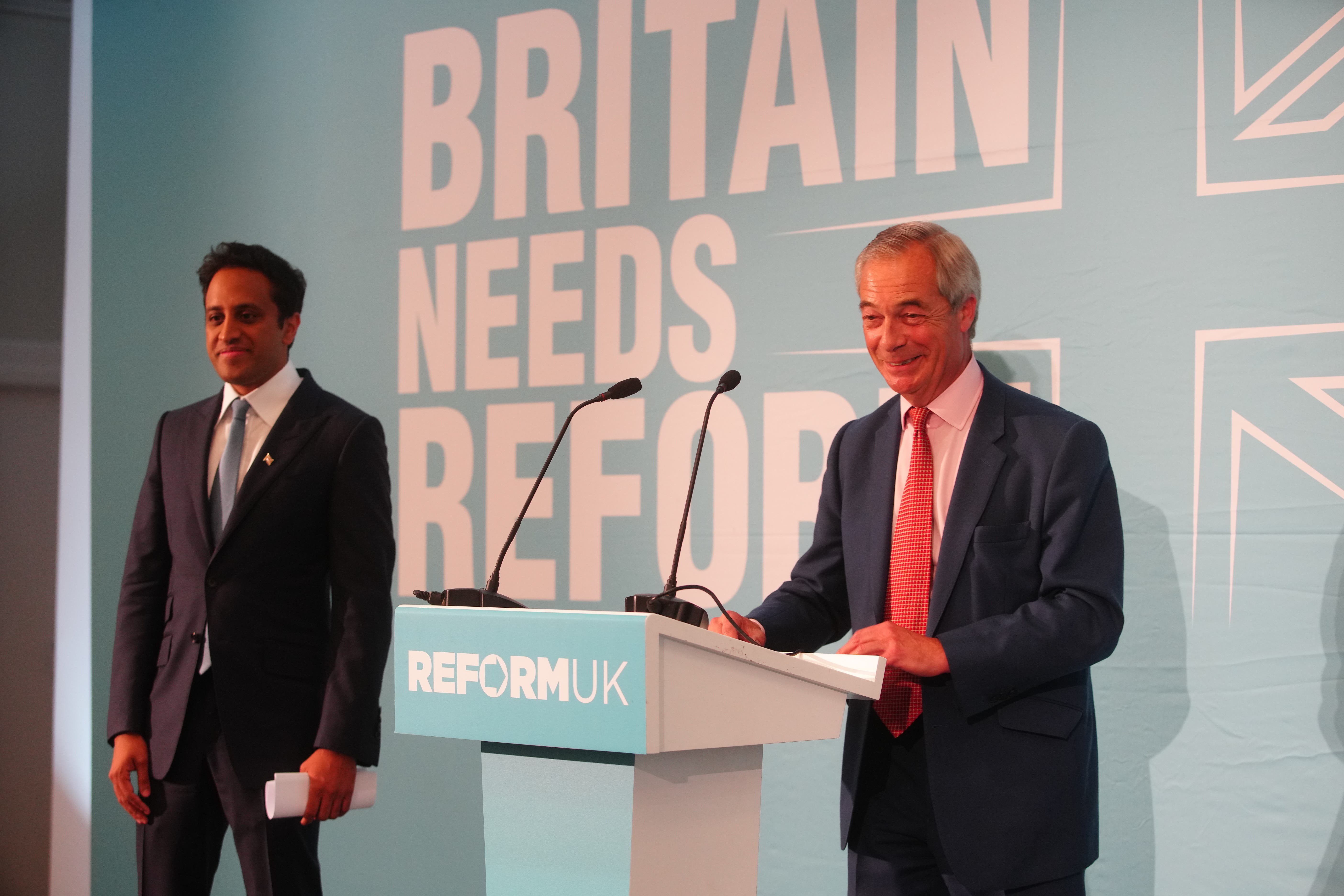 Reform UK leader Nigel Farage, with Zia Yusuf. (Jeff Moore/PA)
