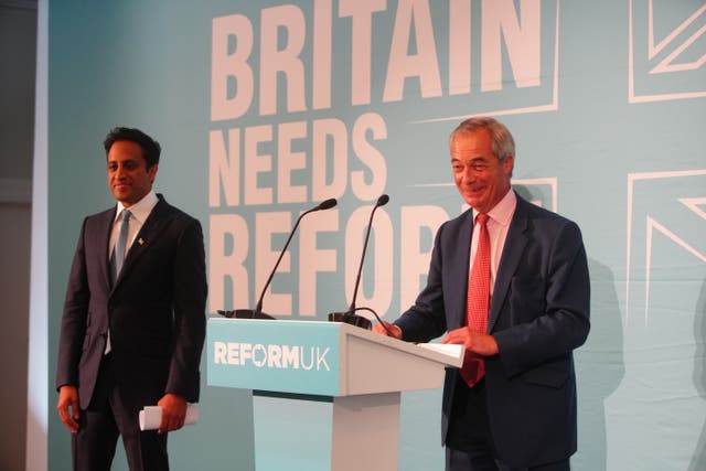 Reform UK leader Nigel Farage, with Zia Yusuf. (Jeff Moore/PA)