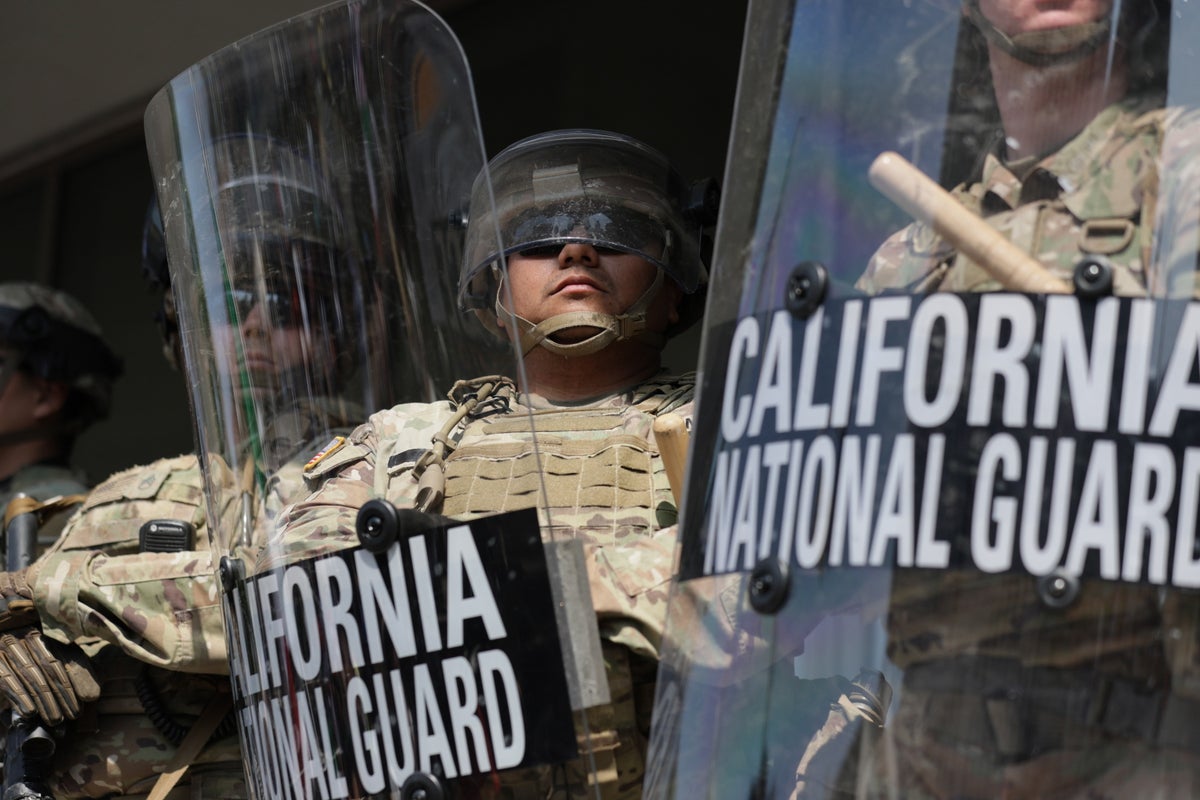 https://static.independent.co.uk/2025/06/12/20/11/California-National-Guard-stationed-outside-federal-building-in-Los-Angeles-trt5ck77.jpeg?trim=0,0,0,0&width=1200&height=800&crop=1200:800