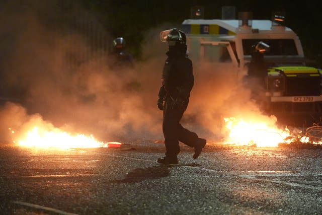 <p>Police in Portadown in Co Armagh, following three nights of disorder in Ballymena, Co Antrim</p>