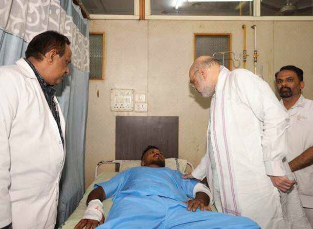 <p>Home Affairs Minister Amit Shah meeting British plane crash survivor Vishwash Kumar Ramesh, 40, at a hospital in Ahmedabad, after Air India confirmed Mr Ramesh was the sole survivor of the 242 people on board the London-bound Boeing 787 Dreamliner</p>