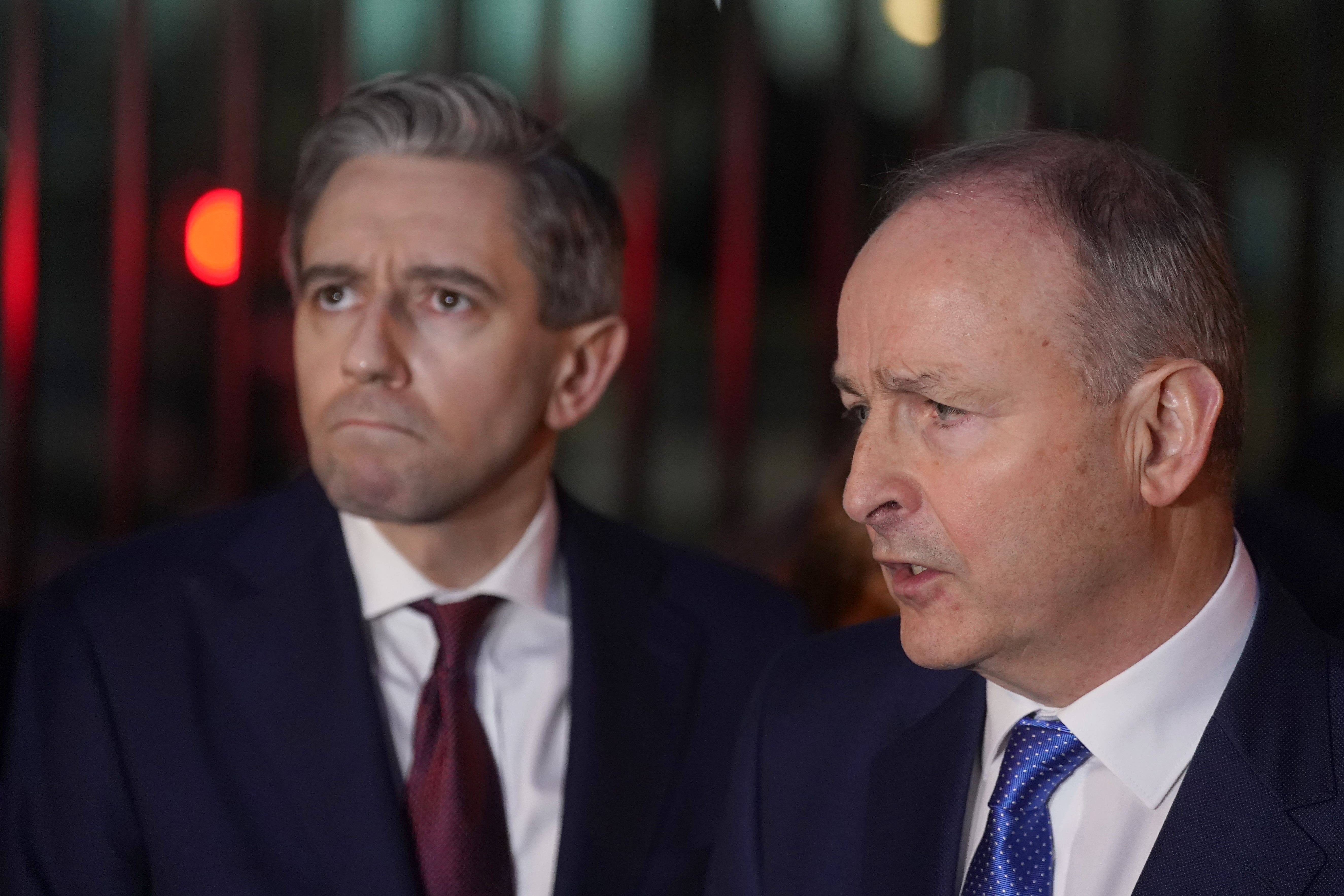 Fine Gael leader Simon Harris TD (left) and Fianna Fail leader Micheal Martin called for diplomacy in the Middle East (PA)