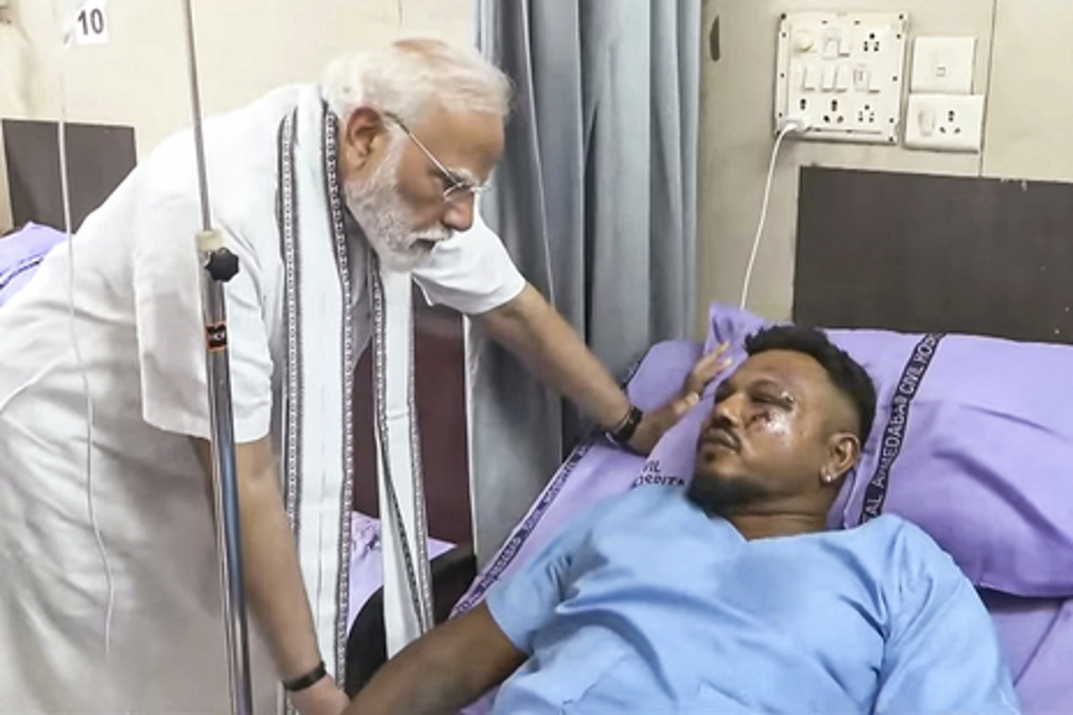 Air India crash: one black box is found as Modi visits miracle survivor in hospital