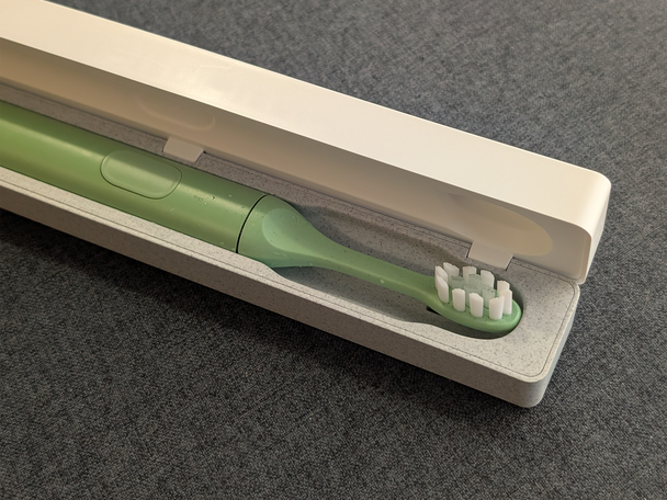 Suri electric toothbrush with travel case