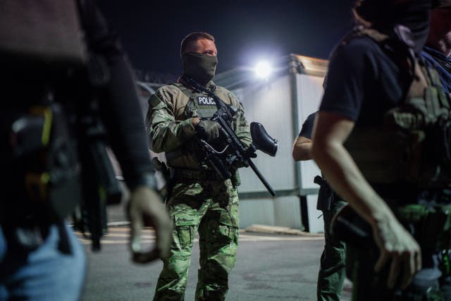 <p>Immigration enforcement agents guard outside the Delaney Hall Detention Facility during a protest over federal immigration enforcement raids on Thursday, June 12, 2025, in Newark</p>