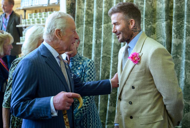 <p>King Charles III and David Beckham during a visit to the RHS Chelsea Flower Show, at the Royal Hospital Chelsea in London</p>