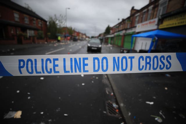 Police tape (Peter Byrne/PA)