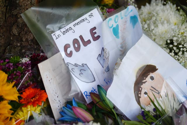 Floral tributes have been left to Cole Cooper near where his body was found (Andrew Milligan/PA)