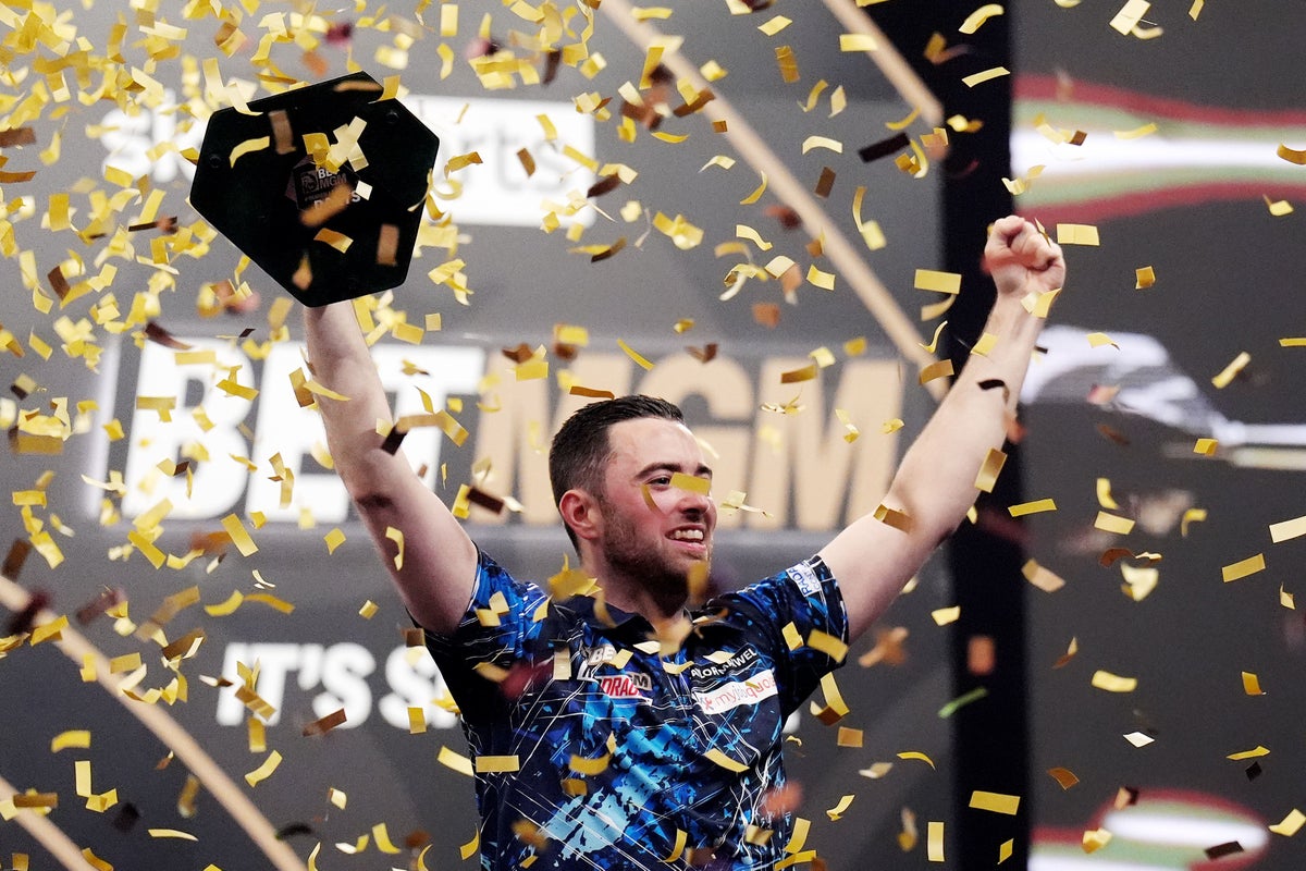Luke Humphries says being made an MBE shows how far he has helped take darts