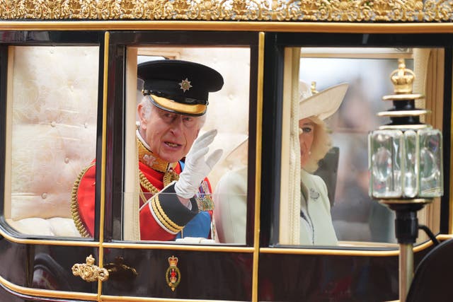 <p>Charles and Camilla travel along The Mall to the Trooping the Colour ceremony at Horse Guards Parade in 2024 (James Manning/PA)</p>