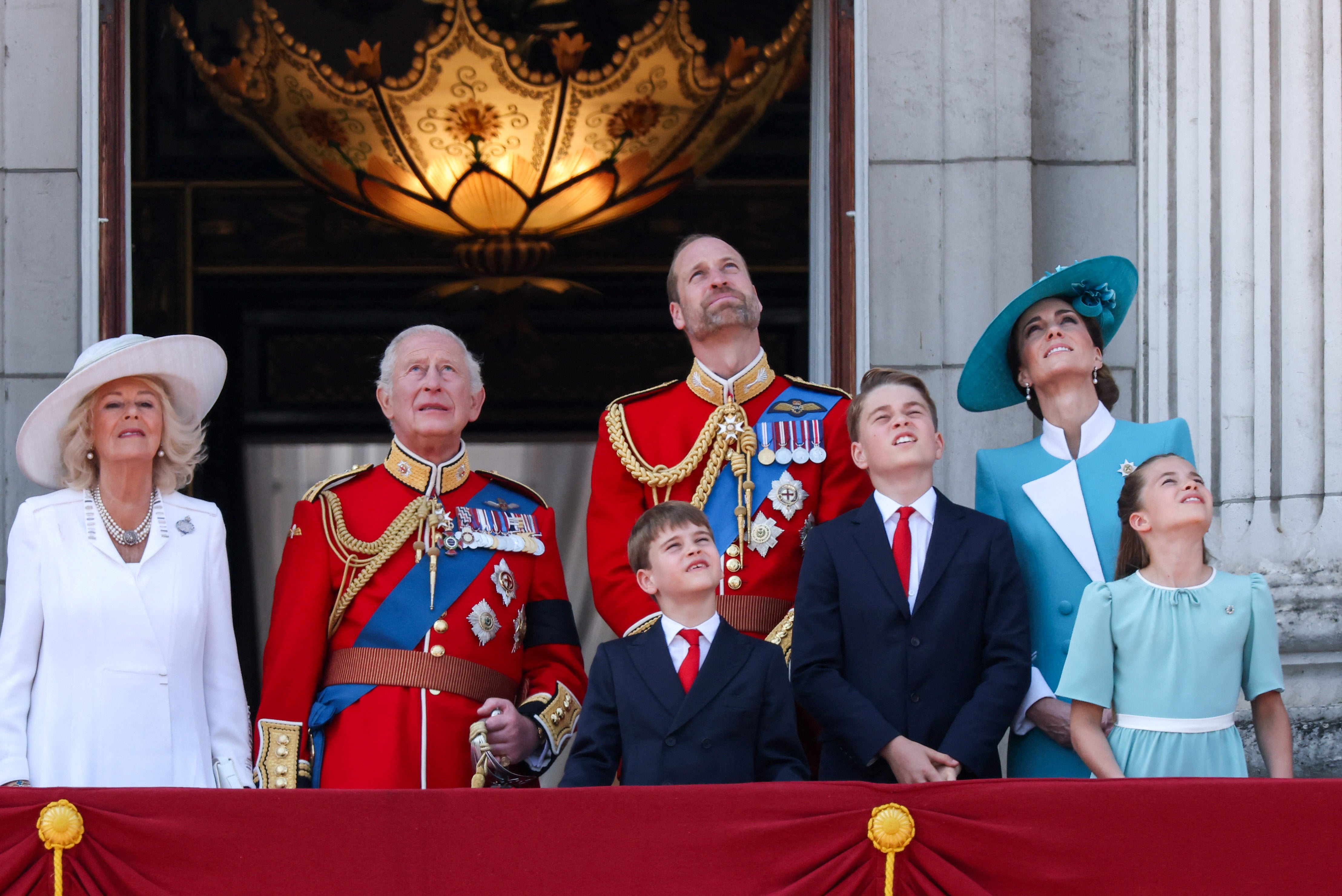 Royal line (from left): Queen Camilla, King Charles, the Prince of Wales, the Princess of Wales, (front row) Prince Louis, Prince George, Princess Charlotte