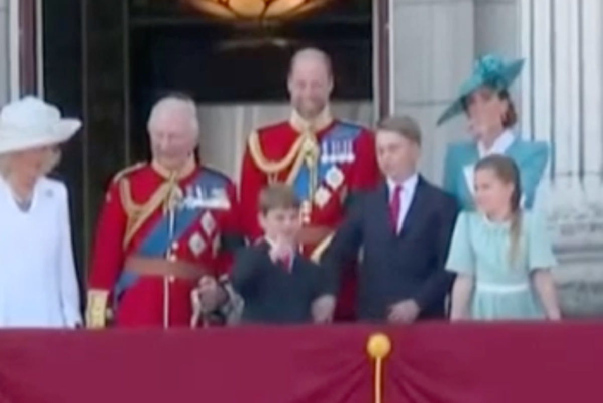 Prince George nudges Louis for waving on Buckingham Palace balcony