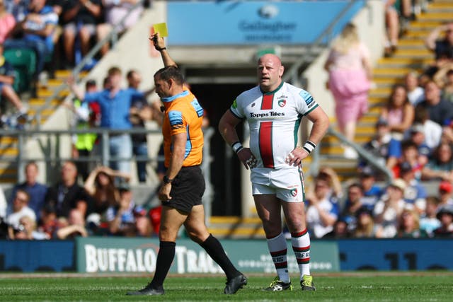 <p>Leicester Tigers' Dan Cole is shown a yellow card by referee Karl Dickson</p>