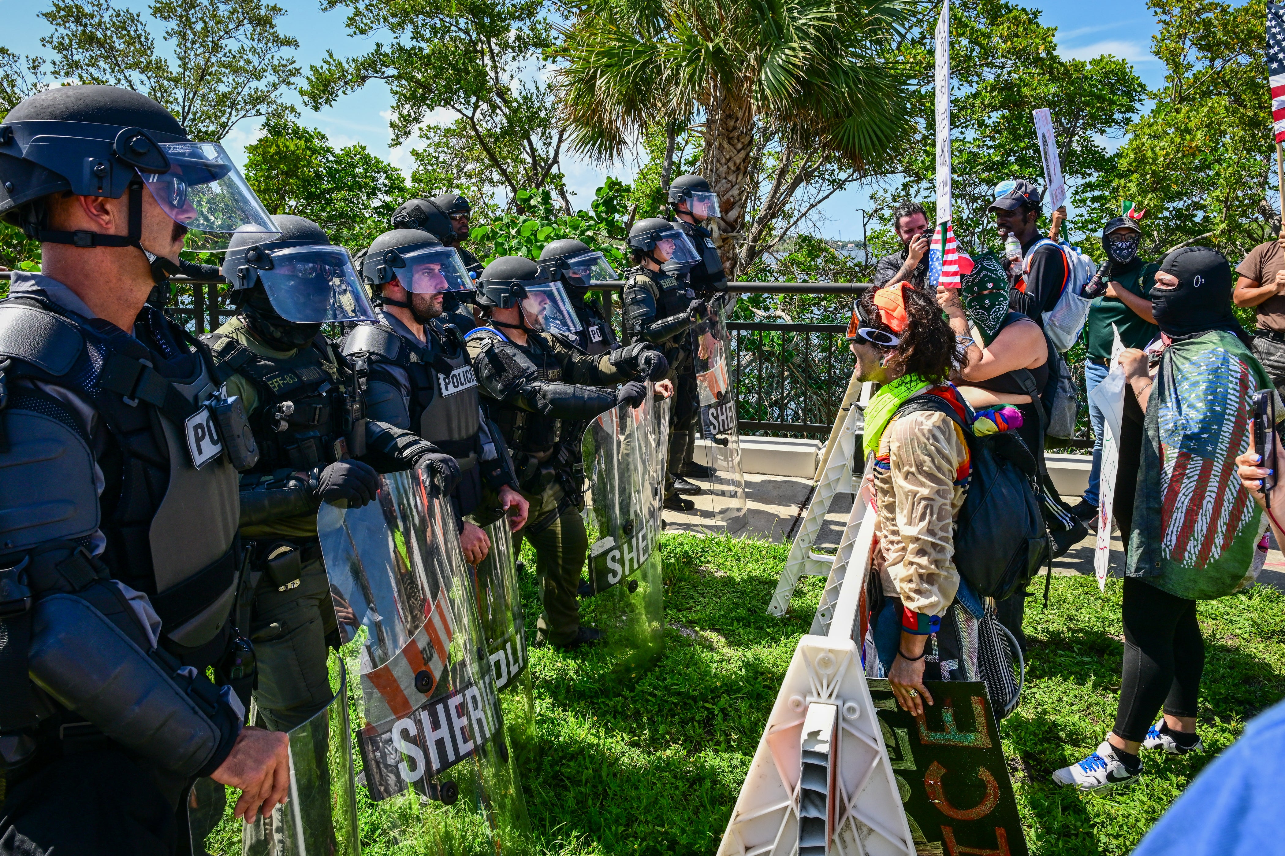 ‘No Kings’ protesters marched on Mar-a-Lago facing police in riot gear