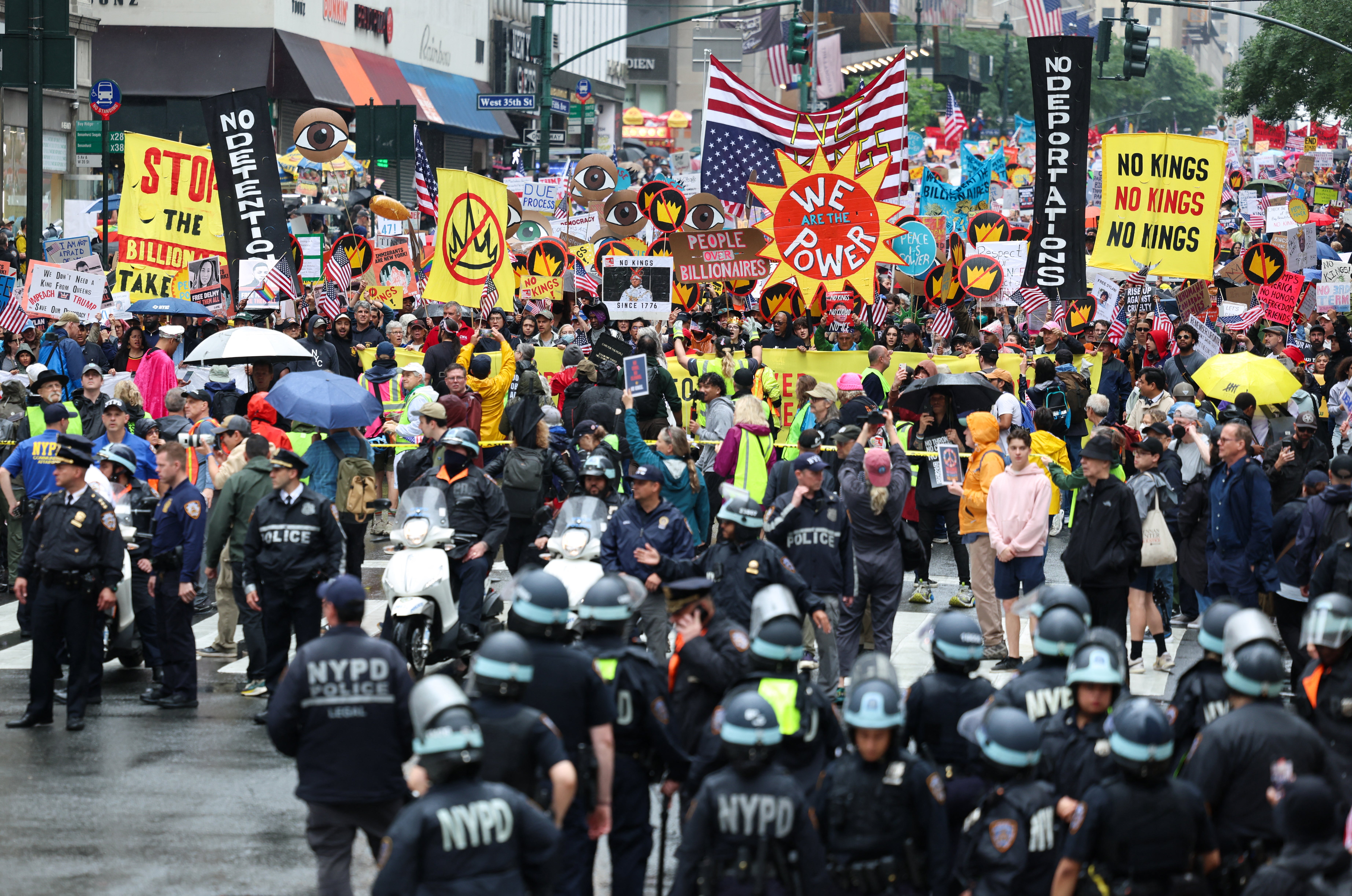In New York, signs, placards and even costumes covered a multitude of frustrations, complaints and anger toward the Trump administration, including furious denouncements of ICE, the president’s parade in Washington, D.C. and the work of the Department of Government Efficiency.