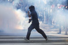 Police deploy tear gas as ‘No Kings’ protesters rally against Trump