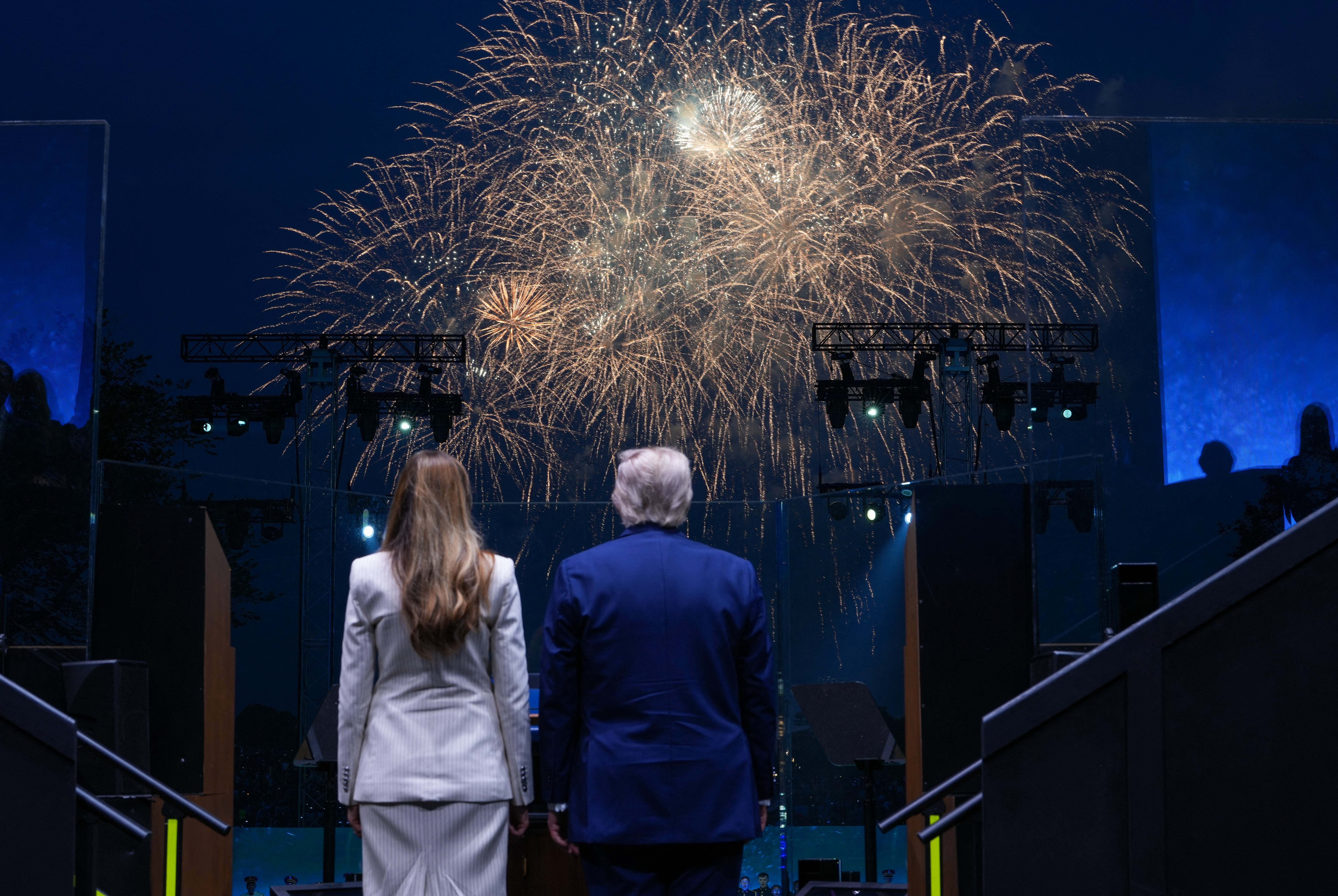 Trump and his wife, Melania, watch the fireworks that ended the parade.