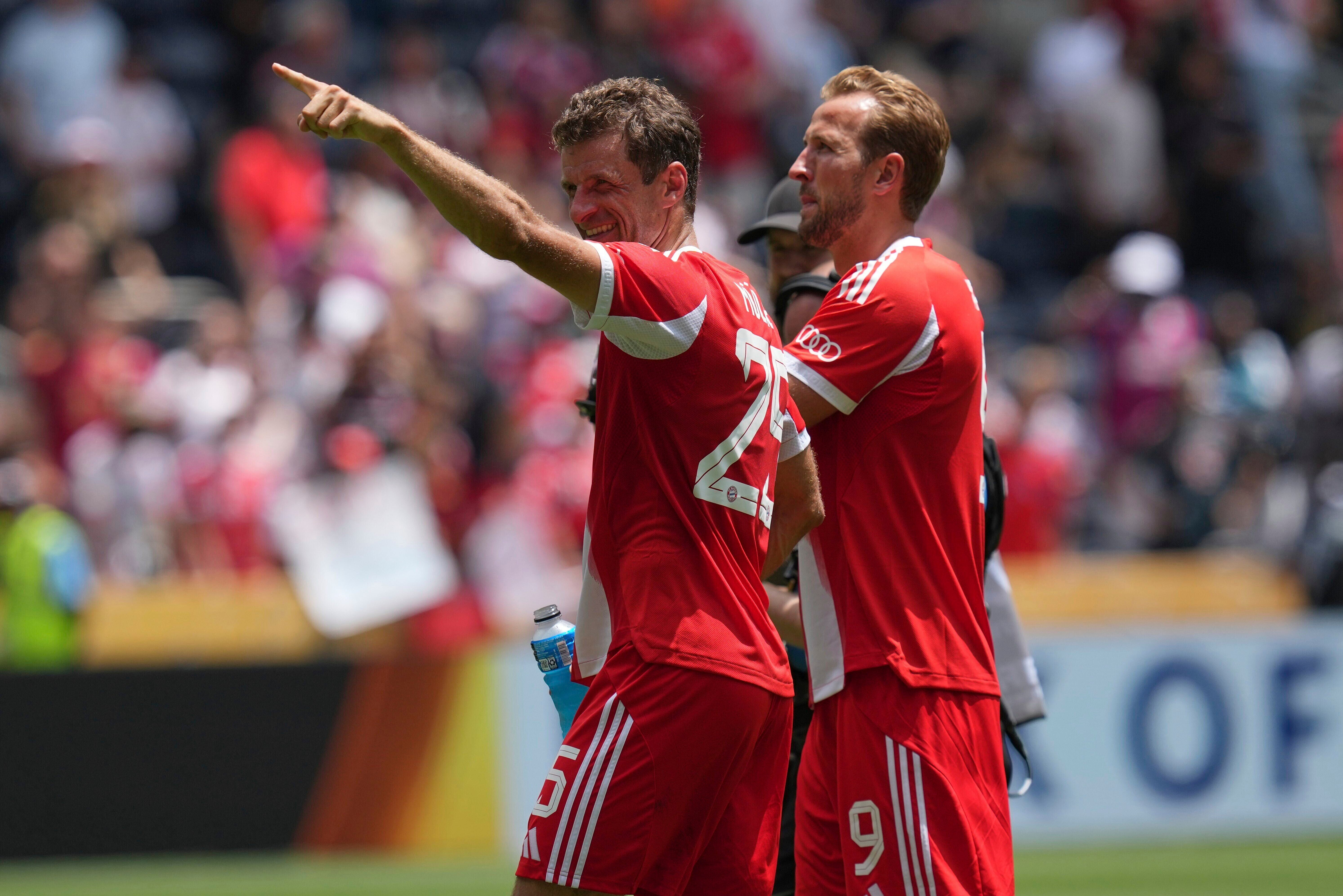 <p>Thomas Muller and Harry Kane during Bayern Munich’s 10-0 win over Auckland City</p>