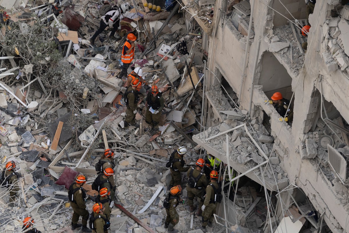 Iran-Israel - live: IDF tells Iranians to evacuate near military sites after missile strikes kill 10 in Israel
