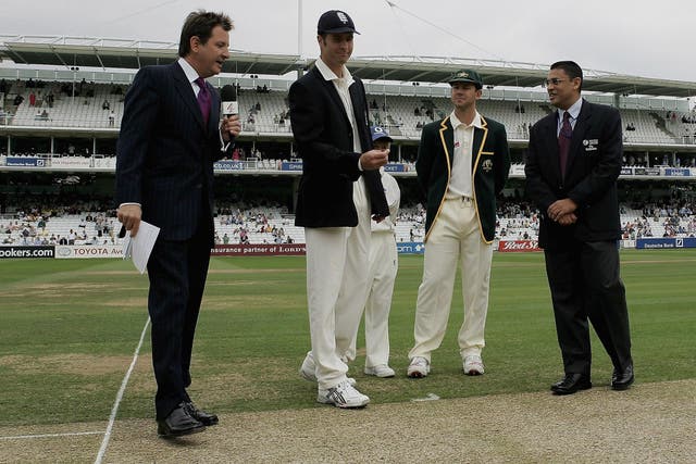 Mark Nicholas, left, presides over the opening coin toss of the 2005 Ashes (Tom Shaw/PA)