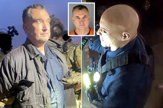 <p>Vance Boelter was described as the ‘face of evil’ by a local sheriff moments after his arrest. He was pictured being handcuffed along a dirt road and is charged with two counts of second-degree murder</p>