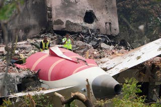 Officials review the place on Thursday of Aircraft