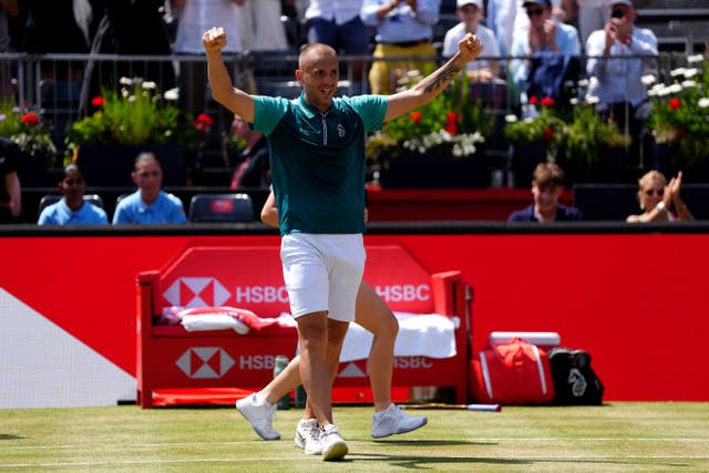 Dan Evans celebrated on the Andy Murray Arena (Ben Whitley/PA)