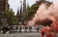 Holidaymakers sprayed by water pistols in Barcelona as part of organised anti-tourism protests across Europe