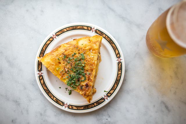 <p>Soft in the centre and golden at the edges – the ultimate crowd-pleasing Spanish omelette</p>