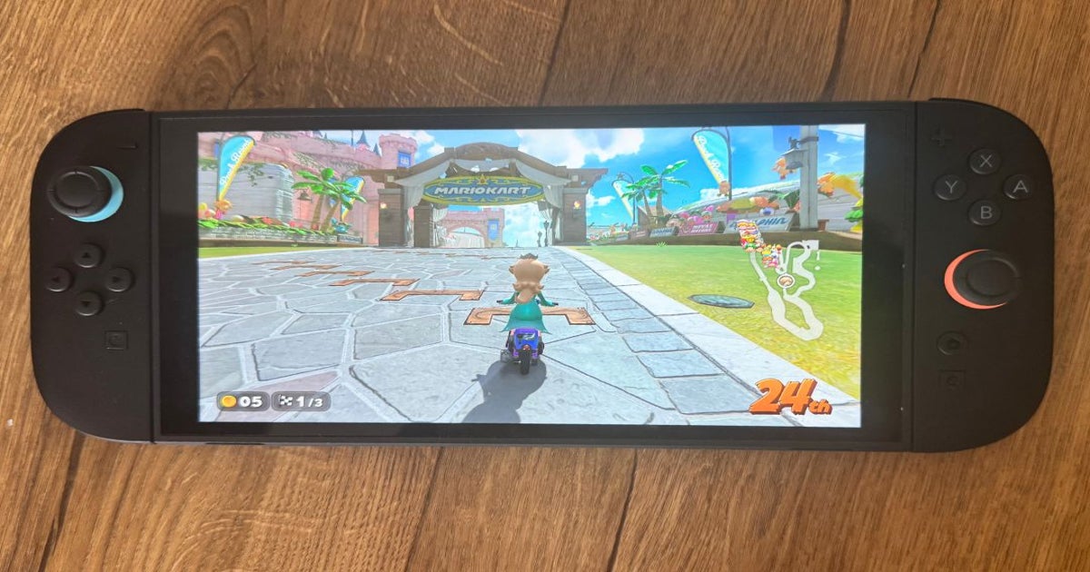 Nintendo Switch 2 handheld playing Mario Kart