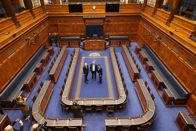Former Northern Ireland secretary Chris Heaton-Harris, Speaker Edwin Poots and then prime minister Rishi Sunak in the Assembly Chamber in 2024 (Liam McBurney/PA)