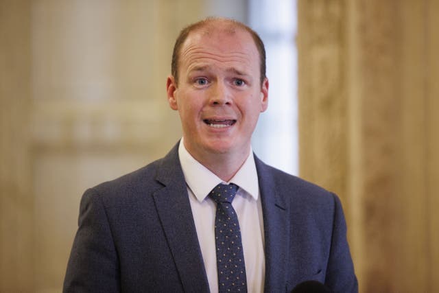 Communities Minister Gordon Lyons launched the strategy (Liam McBurney/PA)