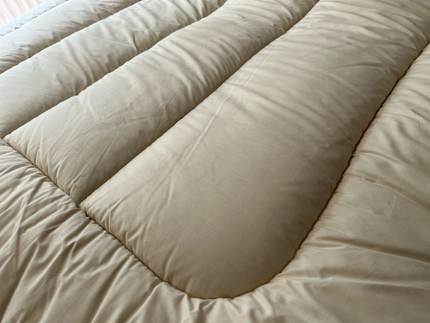 Best cooling mattress topper indybest review Woolroom deluxe washable wool mattress topper